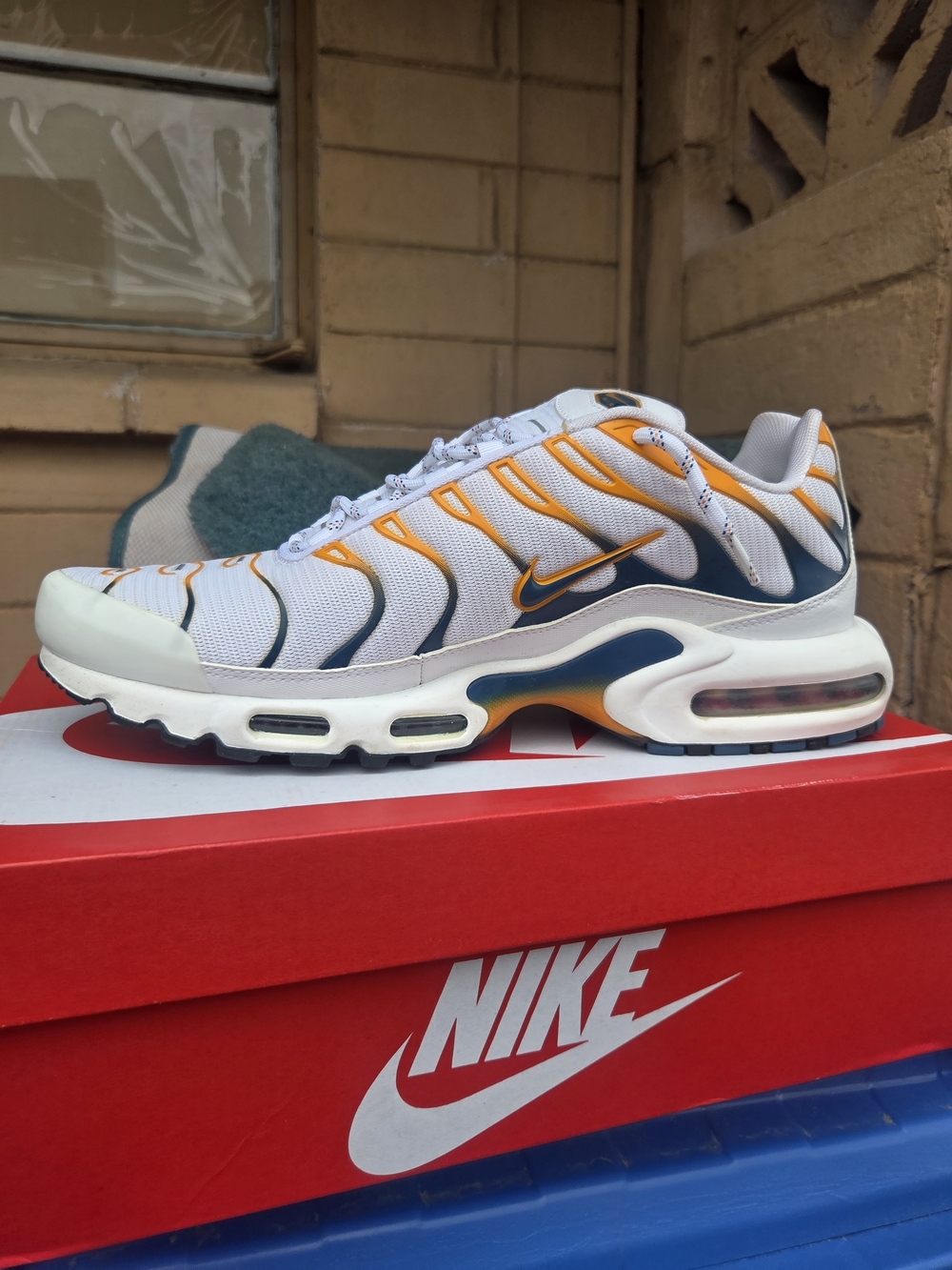 Nike Men’s Air Max Plus White with Orange and Navy Accents